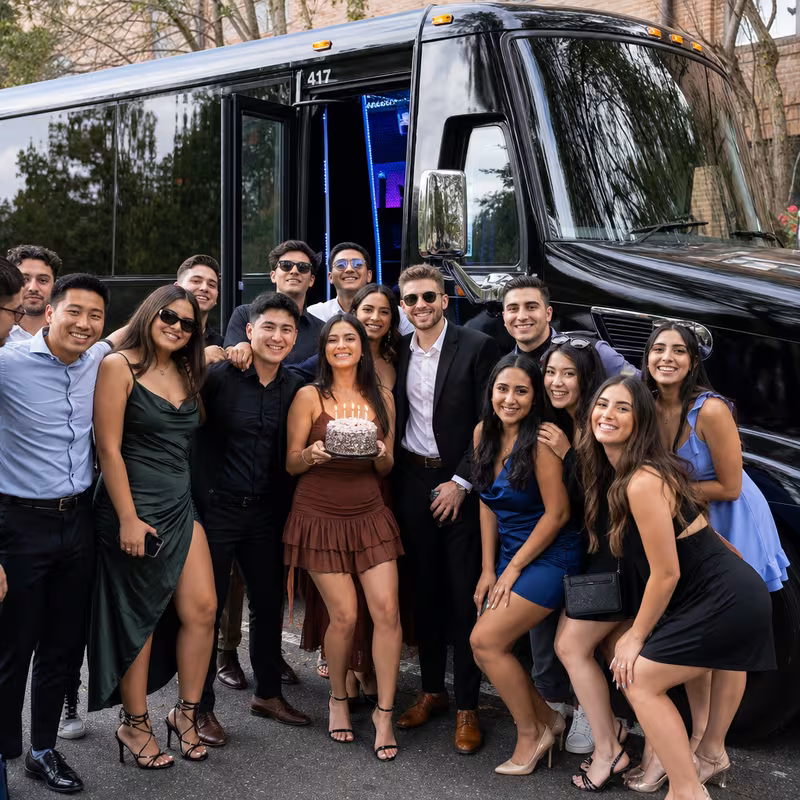 Party bus interior with wraparound leather seating and LED lighting in Grand Prairie