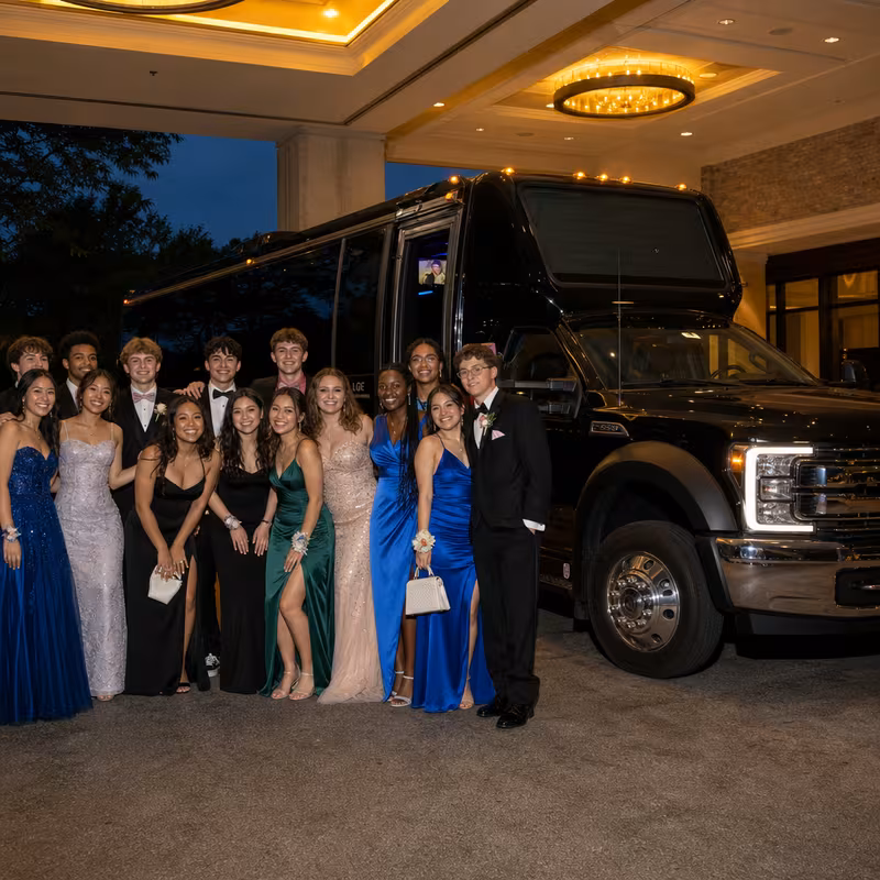 Party bus interior with wraparound leather seating and LED lighting in Grand Prairie