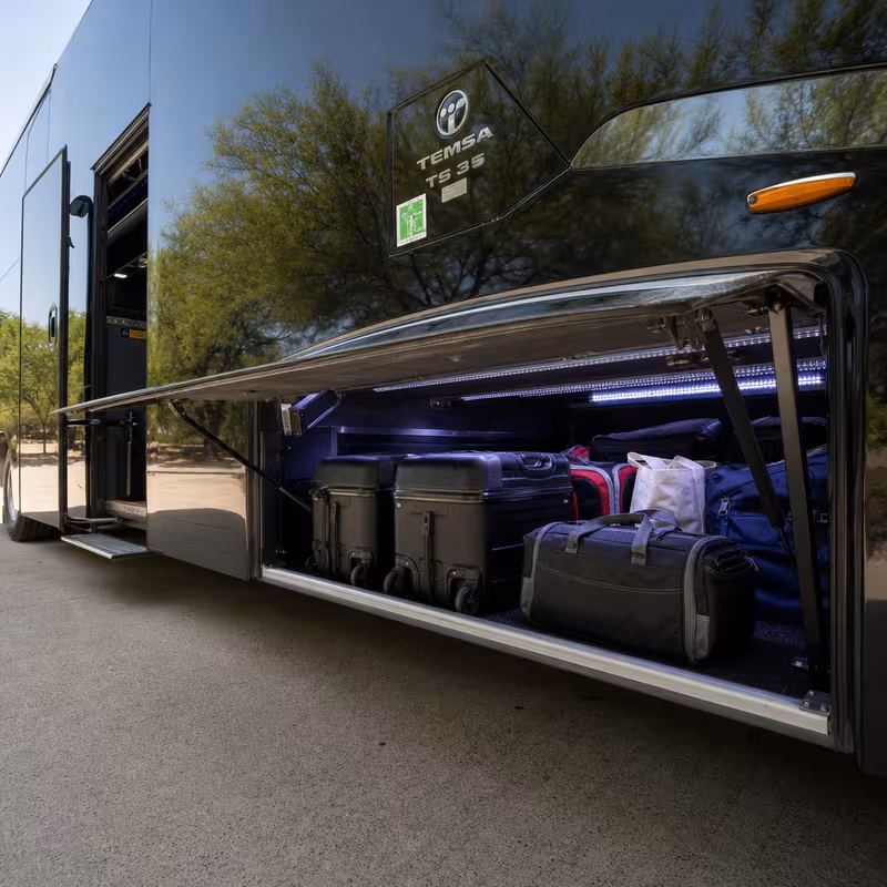 Party bus interior with wraparound leather seating and LED lighting in Grand Prairie