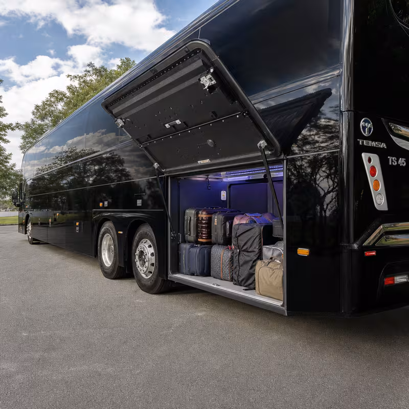 Party bus interior with wraparound leather seating and LED lighting in Grand Prairie